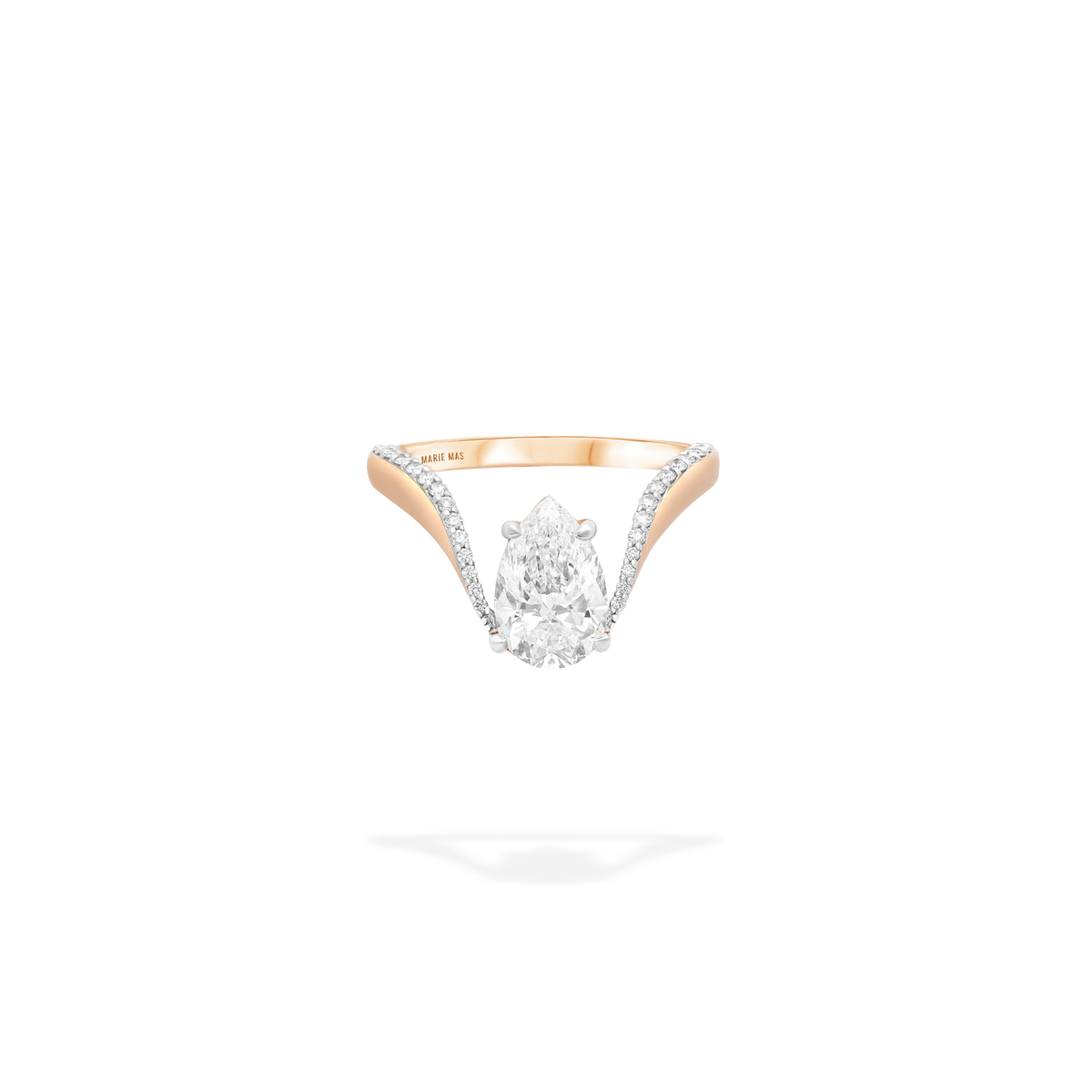 Close-up of the MARIE MAS Aura Ring in 18k rose gold, featuring a large pear-shaped diamond at the center and a row of smaller pavé-set diamonds along the upper part of the band. The ring has a delicate, sculptural silhouette with a refined and elegant finish.