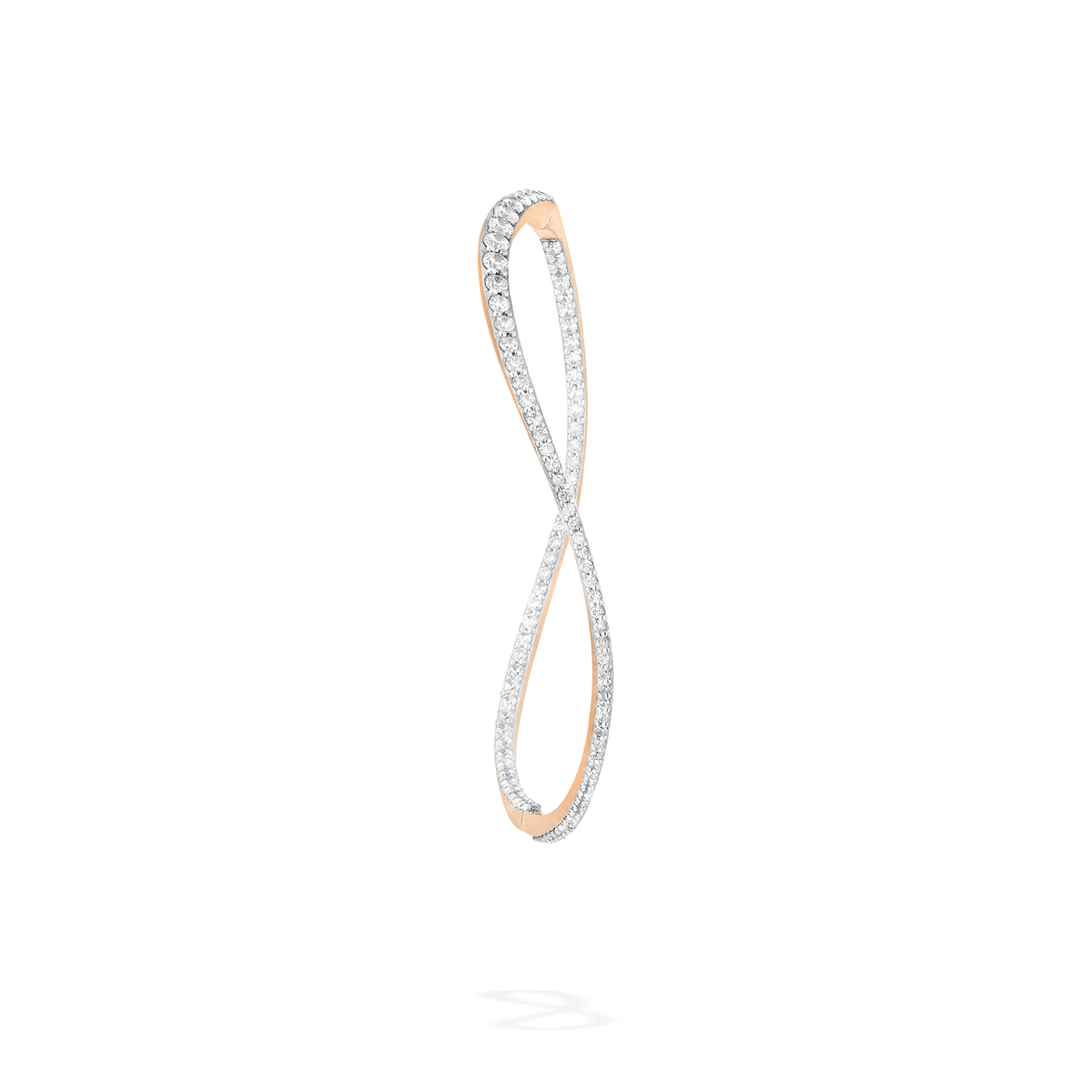 The transformable jewel : a bangle-hoop earring presented as an earring here fom face. This piece is crafted in 18k rose gold and set with natural diamonds.