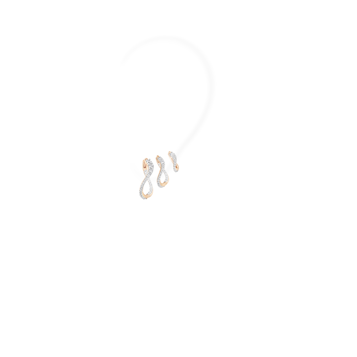 A set composed of three hoop earrings in a gradient size. Each piece is crafted in 18k rose gold and set with natural diamonds. They elegantly wrap the earlobe and create luminous lines.