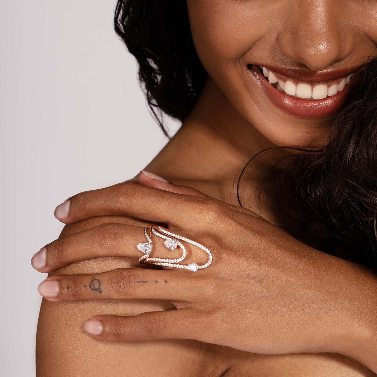 Halo Ring | Half pavé Diamonds & Pear Diamond