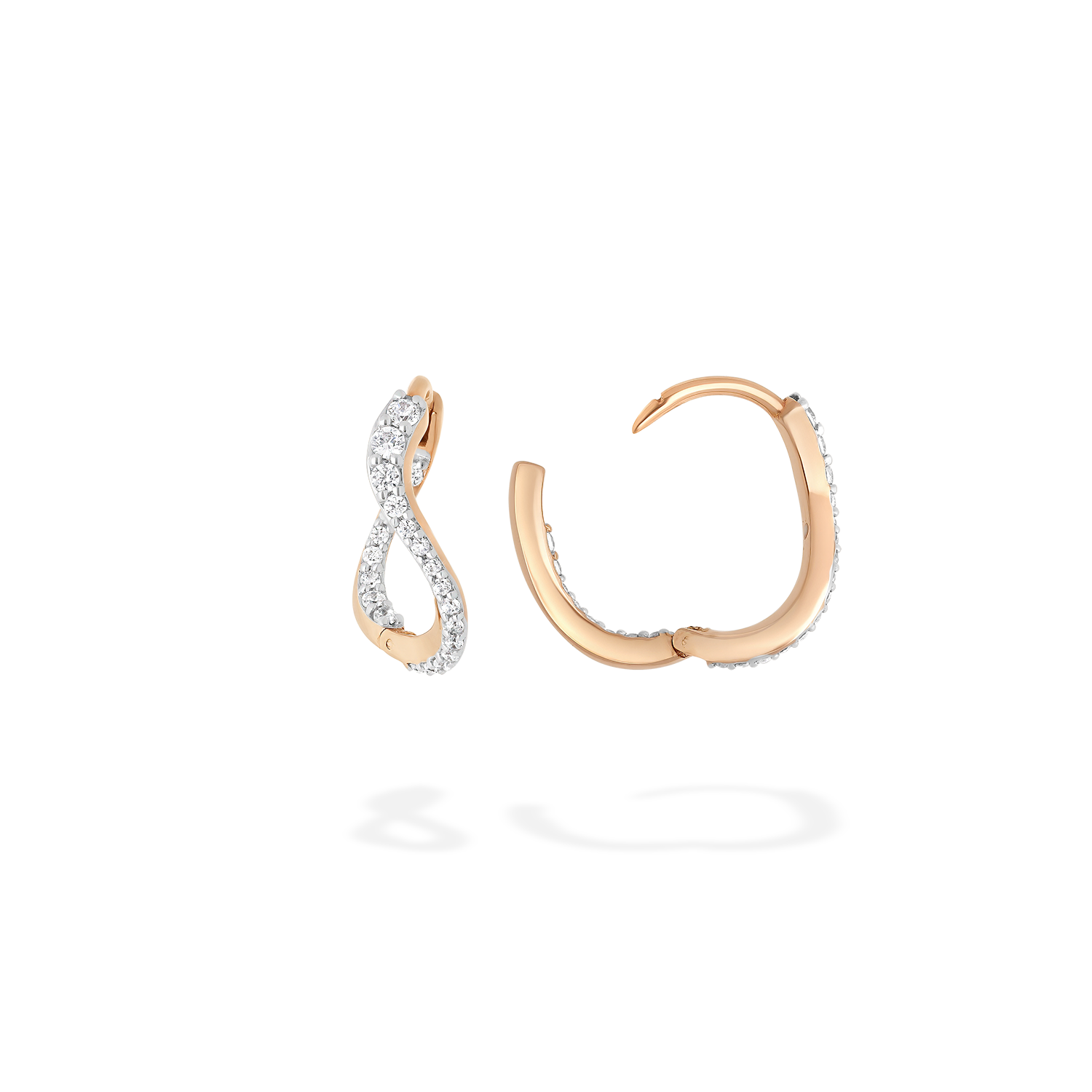 A pair of petite hoop earrings presented here from face and in profile. These pieces are crafted in 18k rose gold and set with natural diamonds. These jewels and their undulations are inspired by the Caustics, the luminous phemonem of light meeting water.
