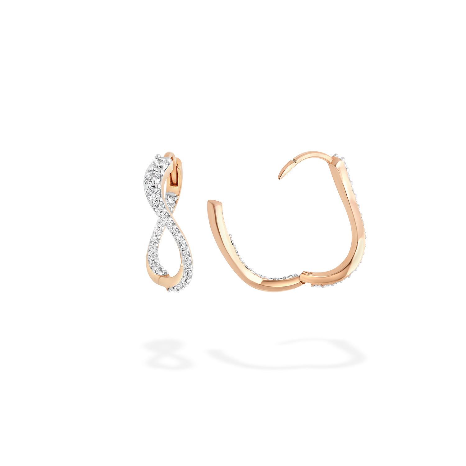 A pair of undulating hoop earrings presented here from face and in profile. This piece is crafted in 18k rose gold and set with natural diamonds. This jewel and its undulations are inspired by the Caustics, the luminous phemonem of light meeting water.
