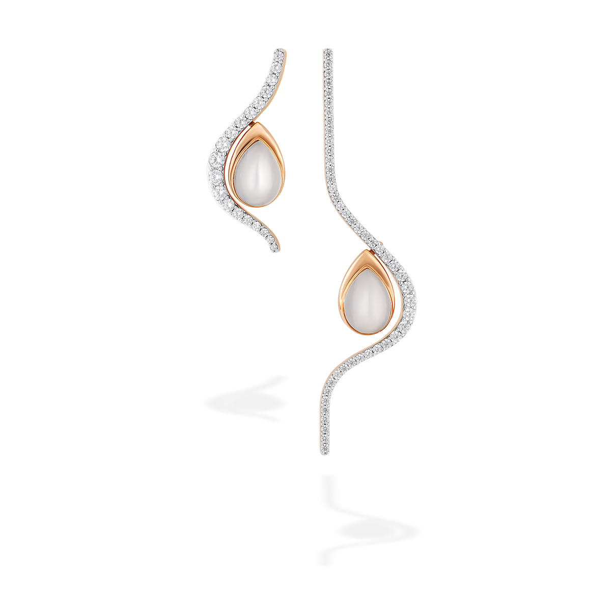 A set composed of four jewels, transformable brooch-earrings : two different diamonds lines and a pair of drop set with white moonstones. These two drop can be attached to and detached from the diamond lines, allowing for multiple ways to wear them. 