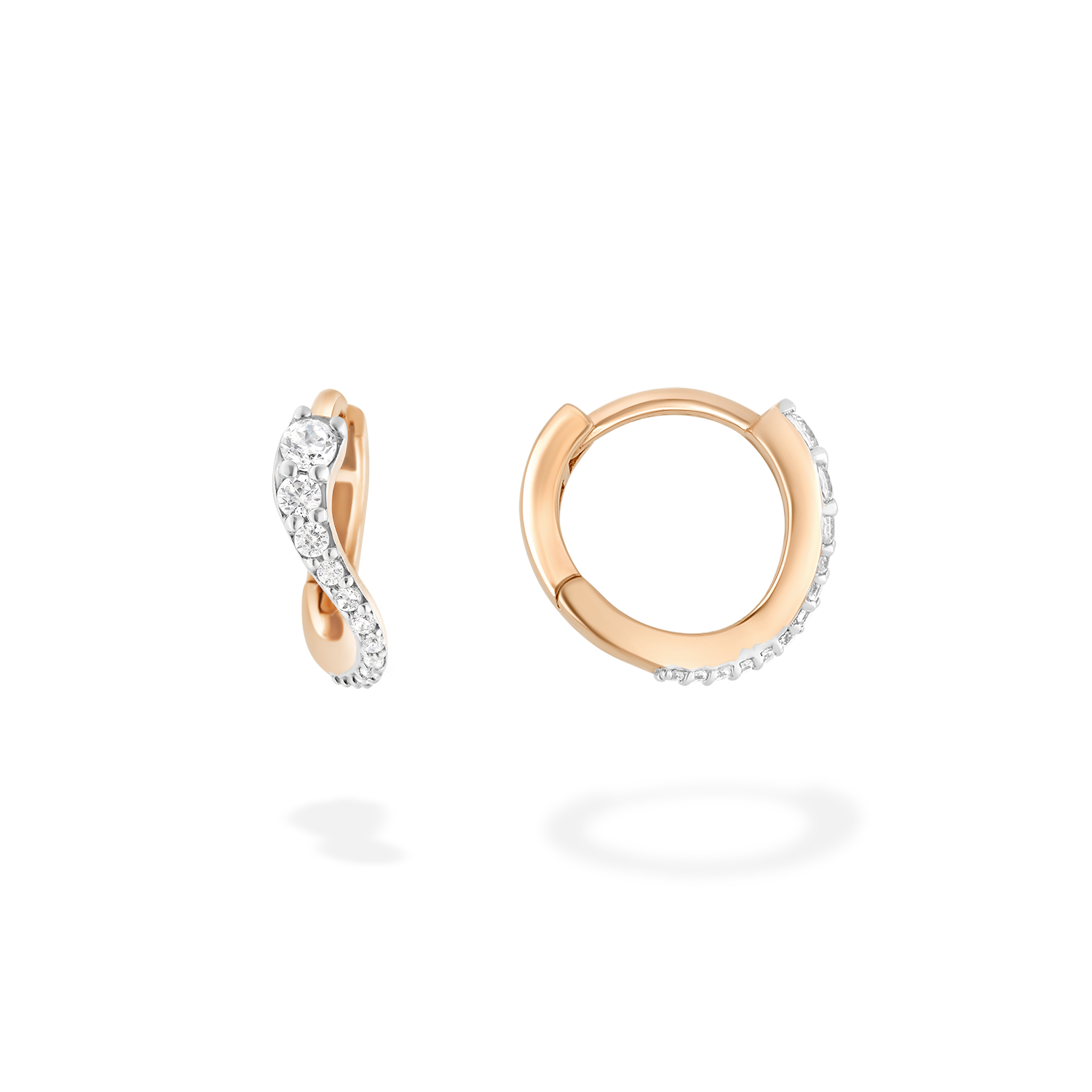 A pair of mini hoop earrings presented here from face and in profile. These pieces is crafted in 18k rose gold and set with natural diamonds. These jewels and its undulations are inspired by the Caustics, the luminous phemonem of light meeting water.