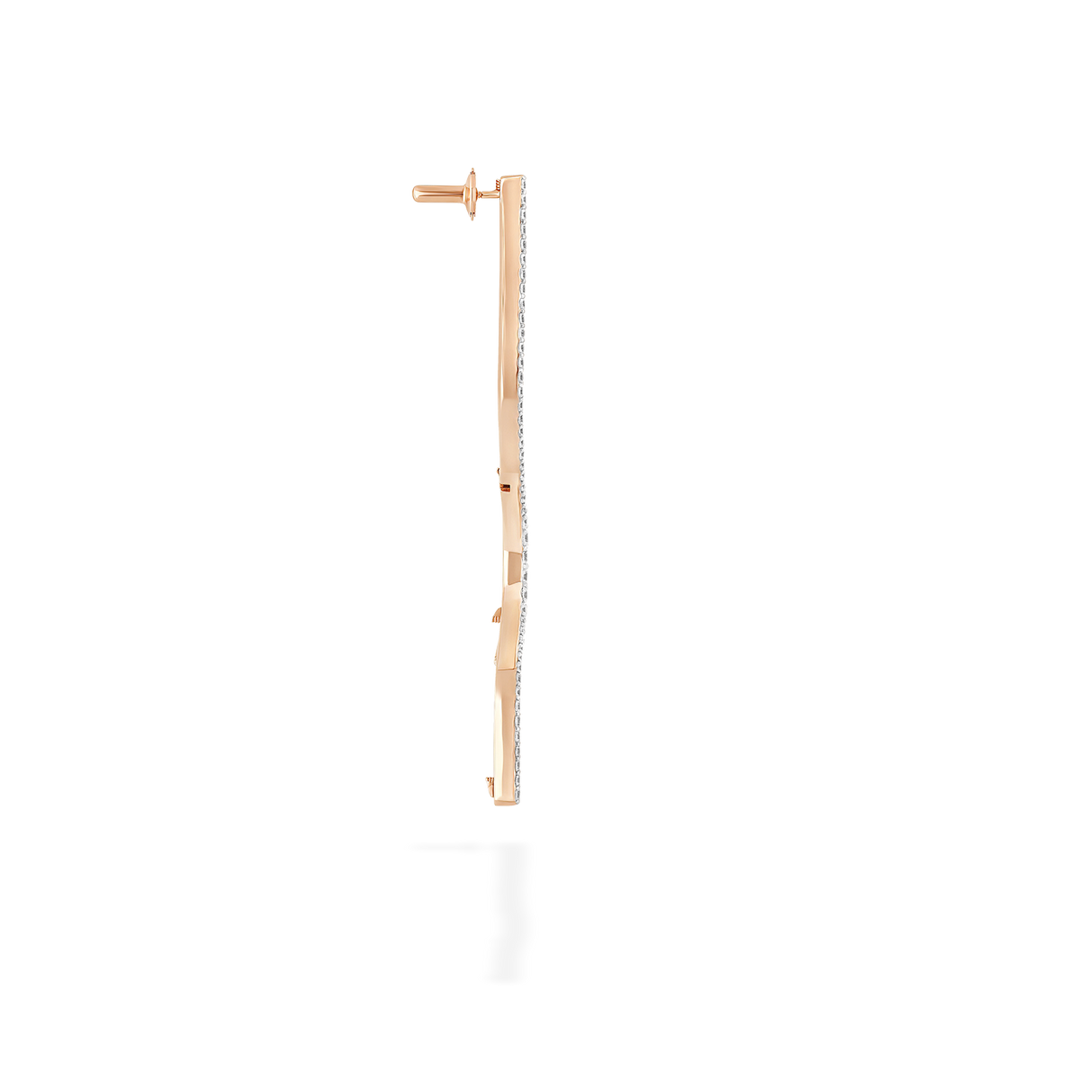 A transformable jewel brooch-earring featuring an ingenious mechanism that allows the posts to retract or extend, ensuring a secure and comfortable wear whether styled on the ear or as a brooch. This fine jewelry piece is crafted in 18k gold and set with natural diamonds. Its curves evoke caustic light, where water and light meet.