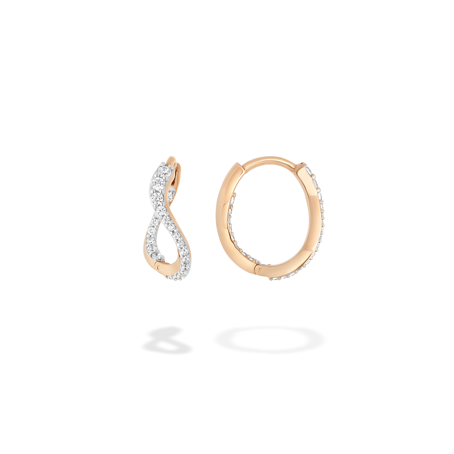 A pair of petite hoop earrings presented here from face and in profile. These pieces are crafted in 18k rose gold and set with natural diamonds. These jewels and their undulations are inspired by the Caustics, the luminous phemonem of light meeting water.