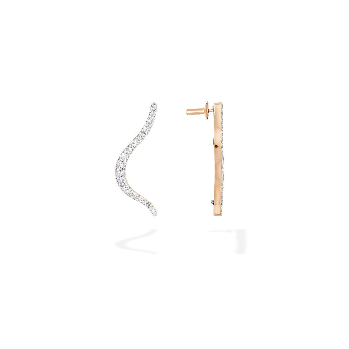 A pair of transformable jewel brooch-earring featuring an ingenious mechanism that allows the pins to retract or extend, ensuring a secure and comfortable wear whether styled on the ear or as a brooch. These fine jewelry pieces are crafted in 18k gold and set with natural diamonds. Its curves evoke caustic light, where water and light meet.
